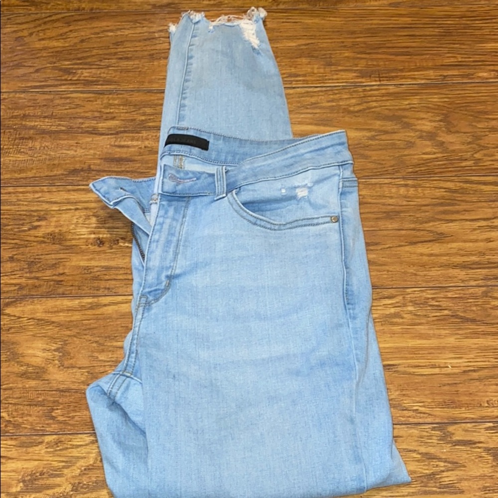 Uniqlo Light Washed Ripped Jeans